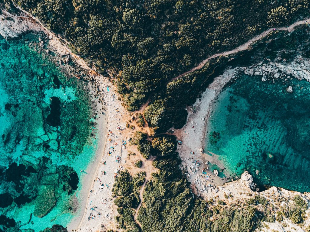 aerial view of people on a beach in corfu island greece